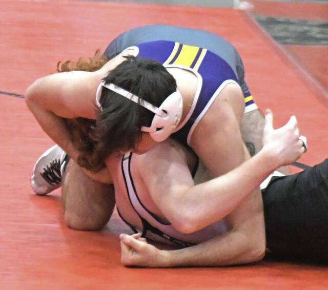 After defending Allegheny County title, Plum wrestlers turn attention to WPIAL playoffs