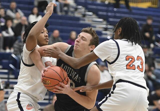 Aquinas Academy boys show they’re no one-man team