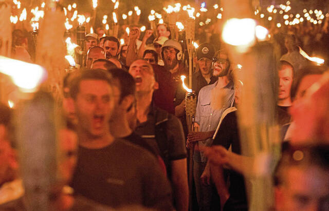 7100645_web1_US-NEWS-EXTREMIST-GROUPS-ESCAPE-ZUM