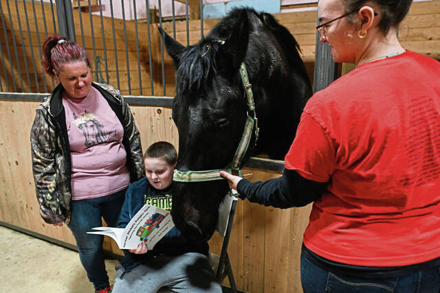 7114119_web1_gtr-horsesread003-022824
