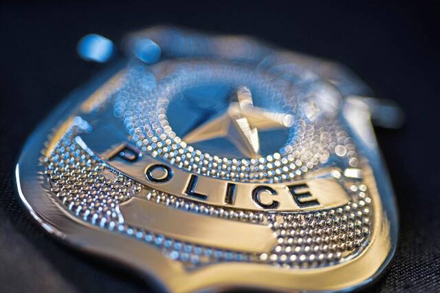 7146943_web1_WEB-PoliceBadge