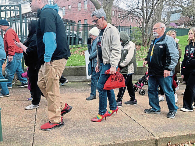 7210378_web1_gtr-WalkaMile2-041424