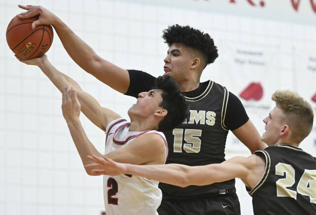 Basketball foes become teammates at Cager Classic