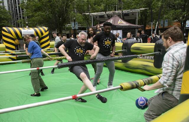 7334405_web1_ptr-HumanFoosball6