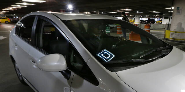 Uber is locking out NYC drivers mid-shift to lower minimum pay |  TribLIVE.com