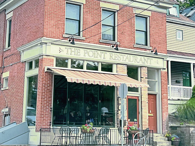 7411278_web1_ptr-dogoutdoordining-060624-11