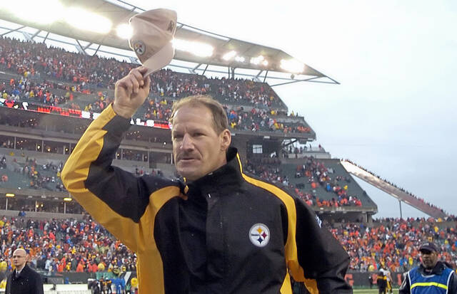 7502736_web1_ptr-Cowher2-123106