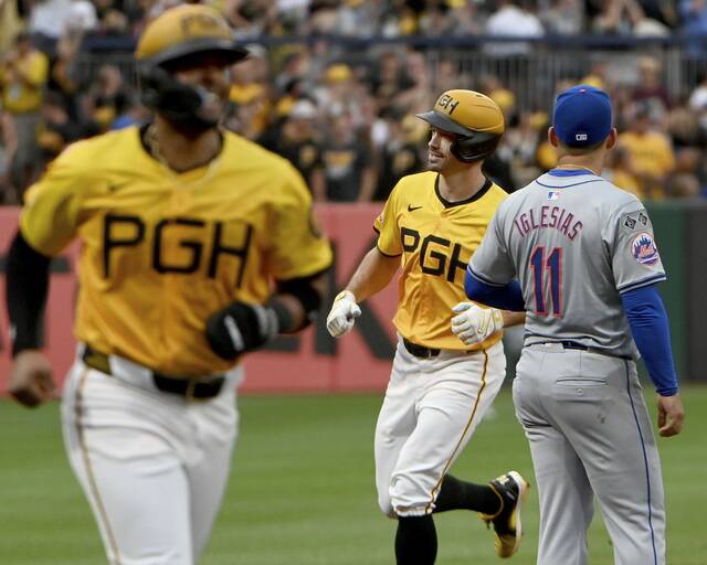 7509633_web1_ptr-BucsMets03-070624