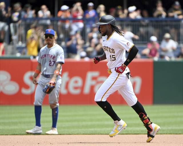 7515358_web1_ptr-BucsMets04-070924