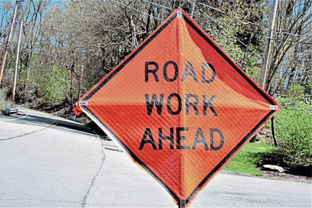 7542030_web1_WEB-road-work-sign