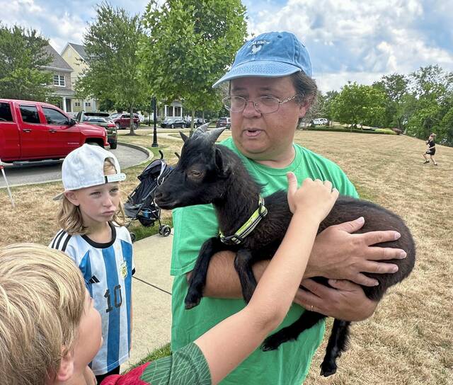 7553334_web1_vnd-GoatReading-072524--6-