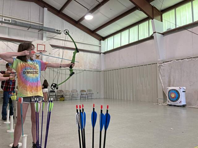 7592538_web1_ptr-Archery1-080324