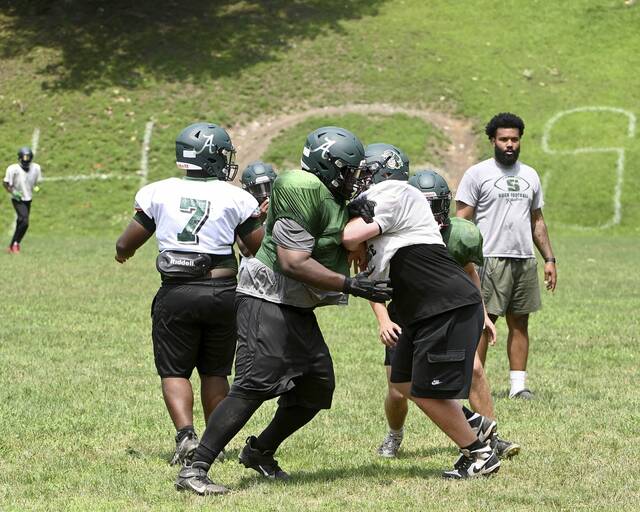 Sad day at Allderdice as football team takes practice field without late coach Jerry Haslett