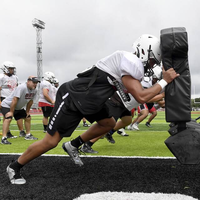 New Castle linemen work out during practice on Friday, Aug. 9, 2024, in New Castle.