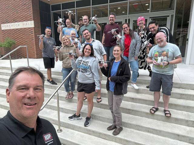7624648_web1_wep-LatDroneTeacher2-081824