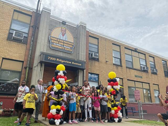 7642371_web1_ribbon-cutting-
