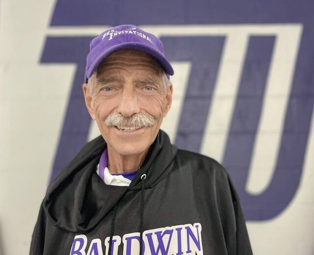 ‘He related to everybody:’ Friends, coaches, athletes mourn Baldwin track and field coach Ed Helbig
