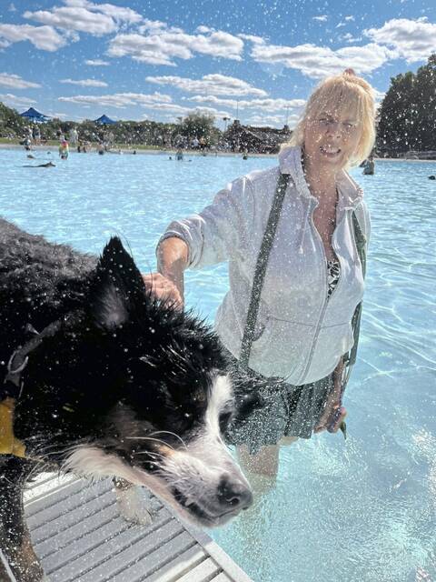 7694382_web1_naj-poochesinpools-091224-13