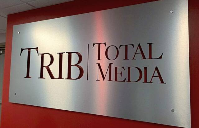 7737264_web1_web-TribSign