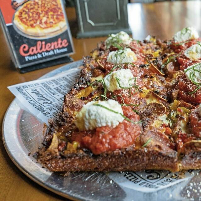 7742812_web1_nhj-Caliente-Pizza2