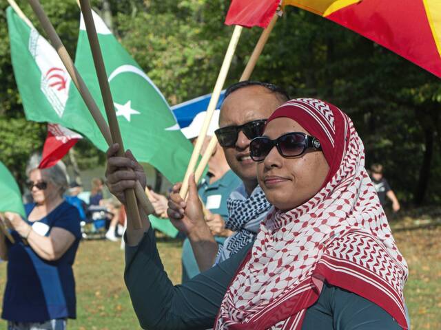 7771577_web1_naj-dayofpeace-100324-1