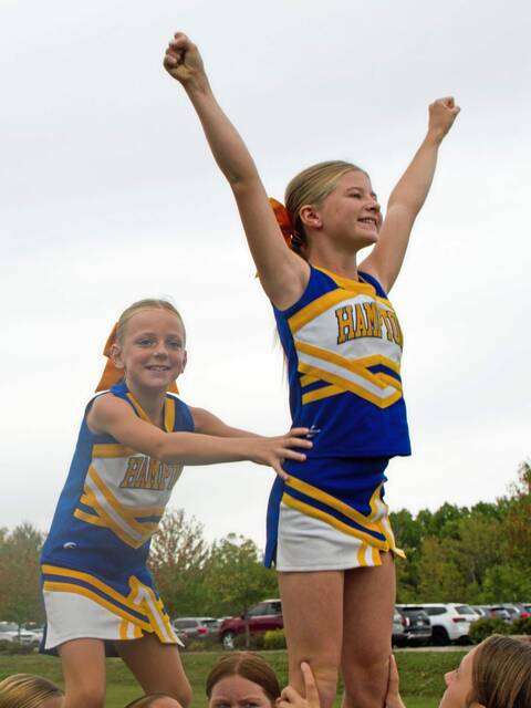 7791458_web1_hj-juniorcheerleaders-103124-2