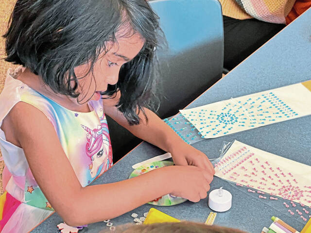 7838144_web1_her-diwali-103124-2
