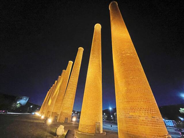 7928631_web1_PTR-The-Waterfront-smokestacks-at-night-Homestead-2024