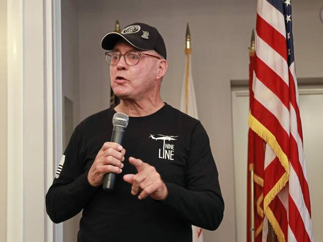 7988519_web1_bpj-veteransbreakfast-121224-8