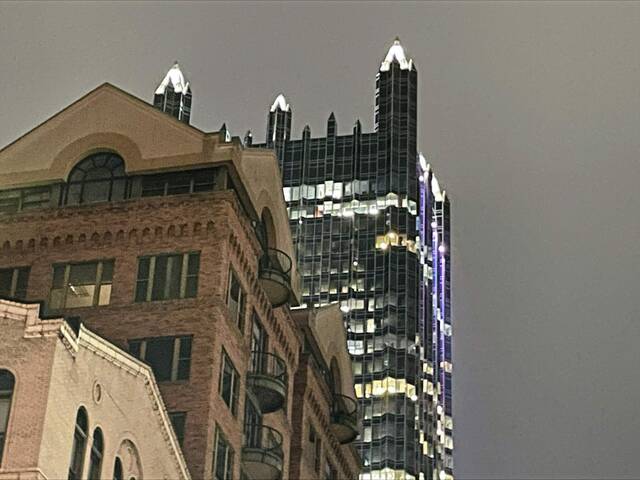 8022147_web1_PTR-PPG-Place-skyscraper-at-night-with-Market-Street-building-Pittsburgh-2024