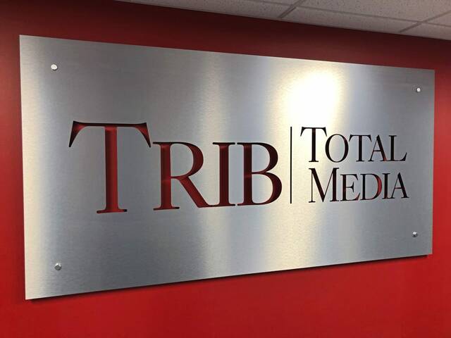 8027480_web1_ptr-trib-total-media-sign