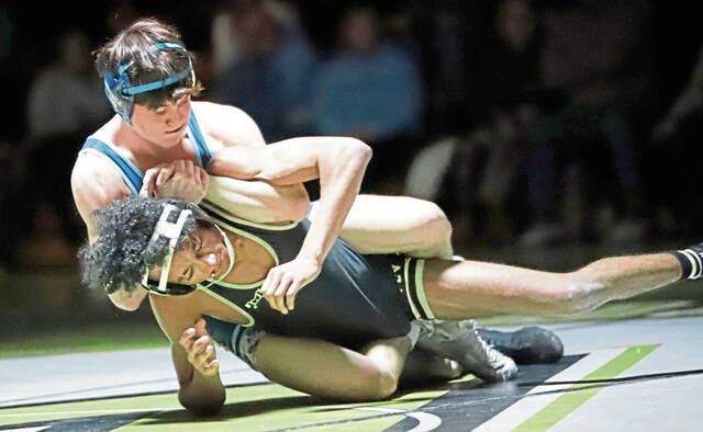 Burrell wrestlers throw weight around in resounding victory over Valley
