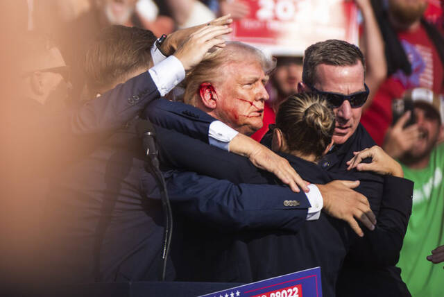 8126612_web1_PTR-TrumpCoveredA-071324