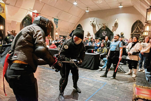 8092070_web1_gtr-swordfight7-021125