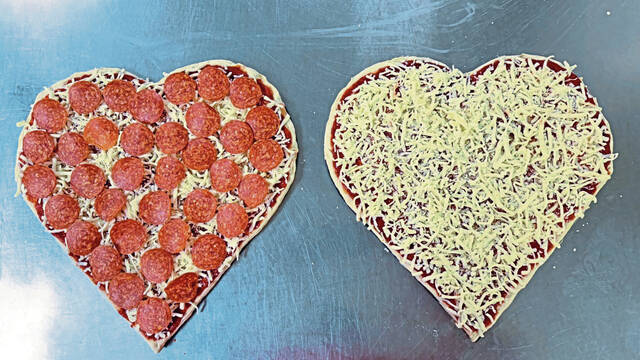 8177651_web1_vnd-VdayPizza-020425--2-