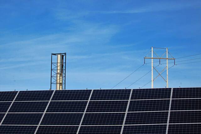 8246925_web1_WEB-solar-panel-windmill-powerline