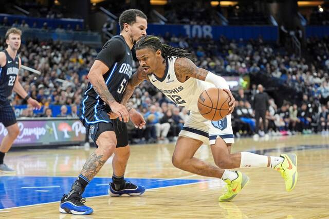 Alumni funds new Ja 2 sneakers for Jeannette boys to wear in WPIAL championship game