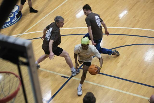 8256343_web1_wep-charityBBall3-030925-