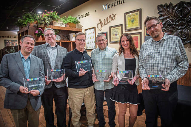 8289620_web1_gtr-TribAwards1-031225