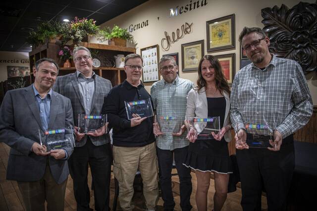 8306077_web1_gtr-TribAwards1-031225