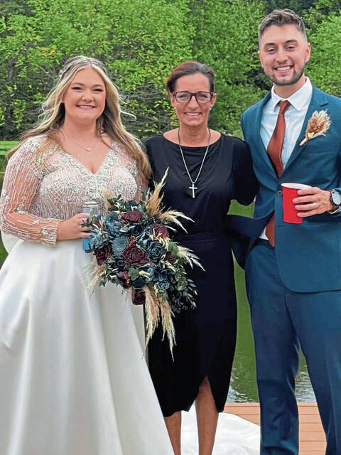 8339311_web1_her-officiant-040325-2