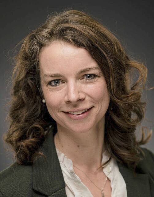 8396686_web1_sig-SusiePuskar
