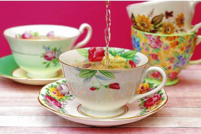 8415632_web1_Teacup-and-Saucer