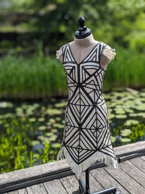 8454006_web1_naj-NASDricegatsbydress-050825