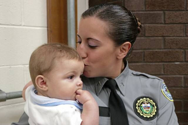 8473846_web1_her-femalecop-051525-4