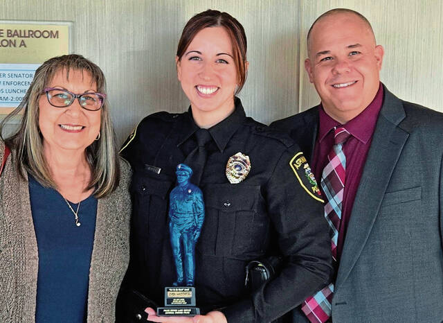 8473846_web1_her-femalecop-051525-5