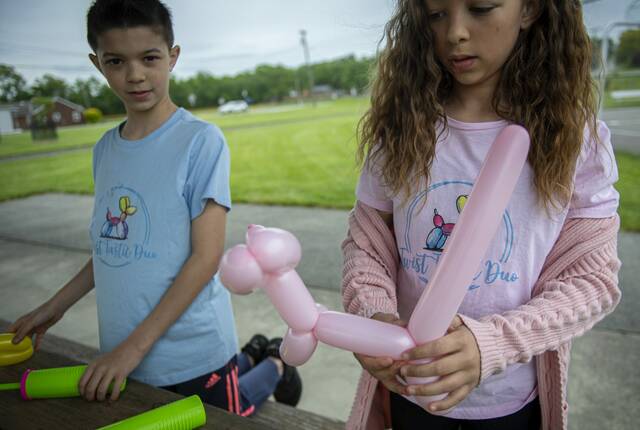 8543196_web1_vnd-BalloonBuilding9-052825