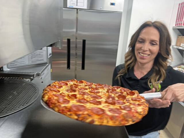 8561961_web1_her-pizzaautism-061225-2