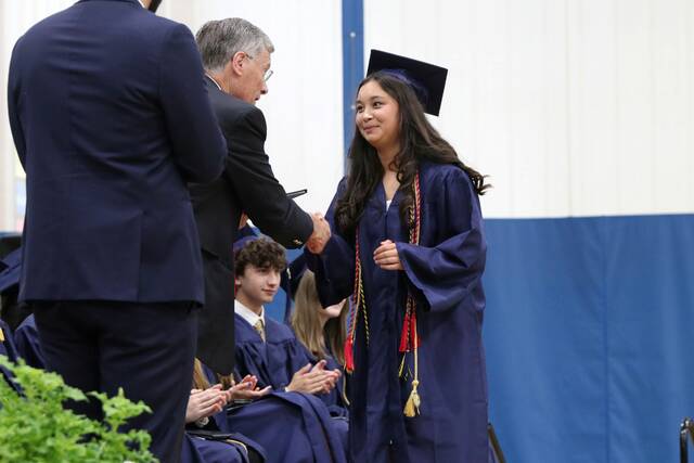 8585230_web1_hj-AquinasGradVale-061925