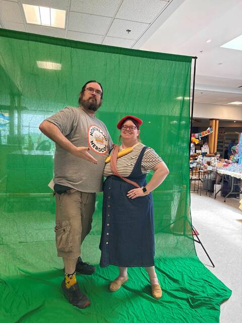 8611231_web1_naj-NClibrarianhubby-062625